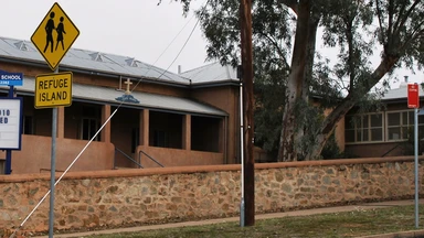 Exterior school with children crossing sign in Australia